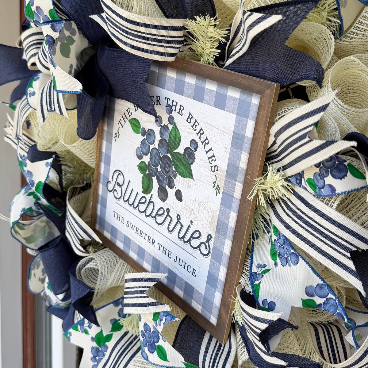 Blueberry Summer Cottage Wreath featuring blueberry-print ribbons, navy and cream accents, decorative bows, and a blueberry sign for front door decor.