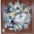 Blueberry Summer Cottage Wreath featuring blueberry-print ribbons, navy and cream accents, decorative bows, and a blueberry sign for front door decor.